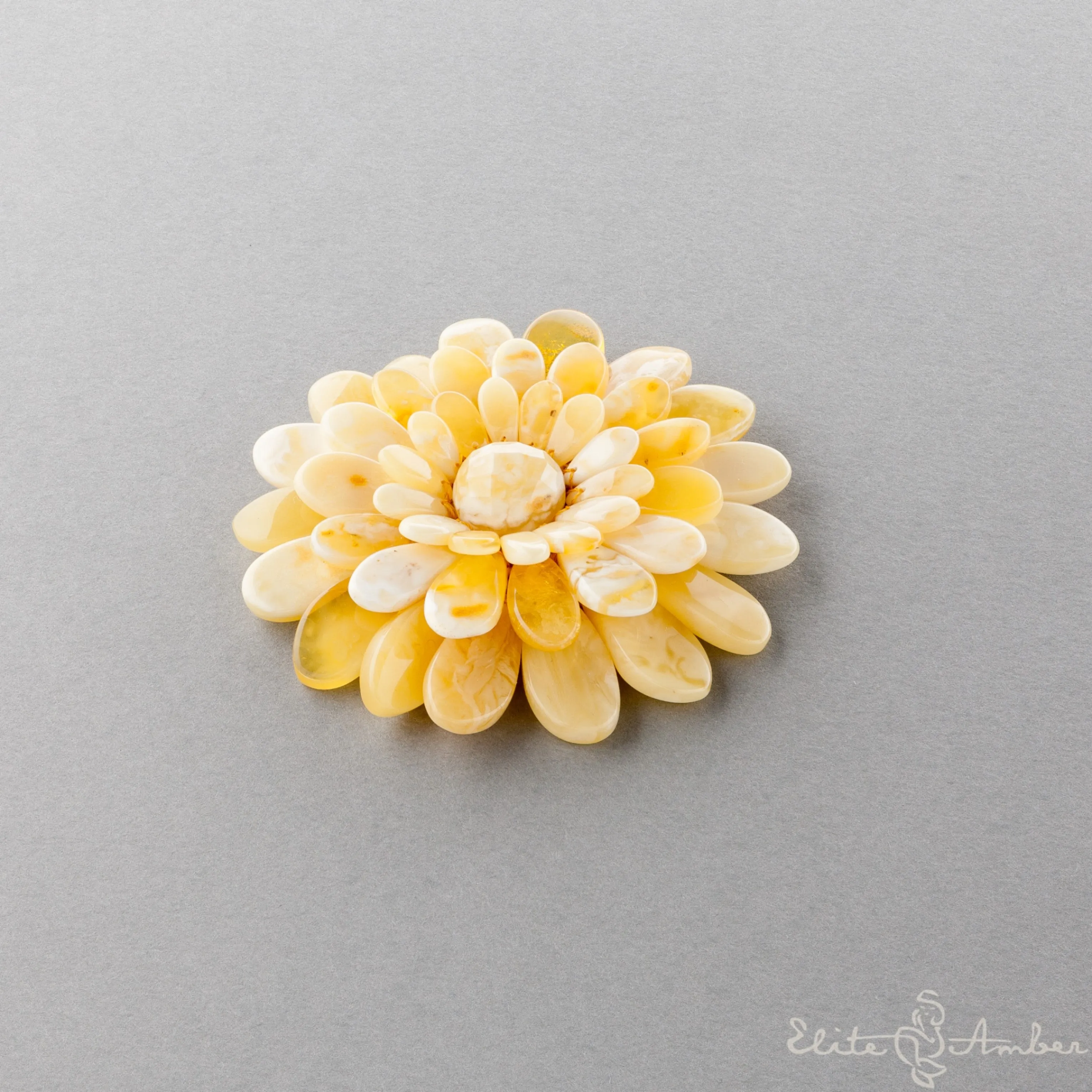 Amber brooch-pendant "Chamomile"