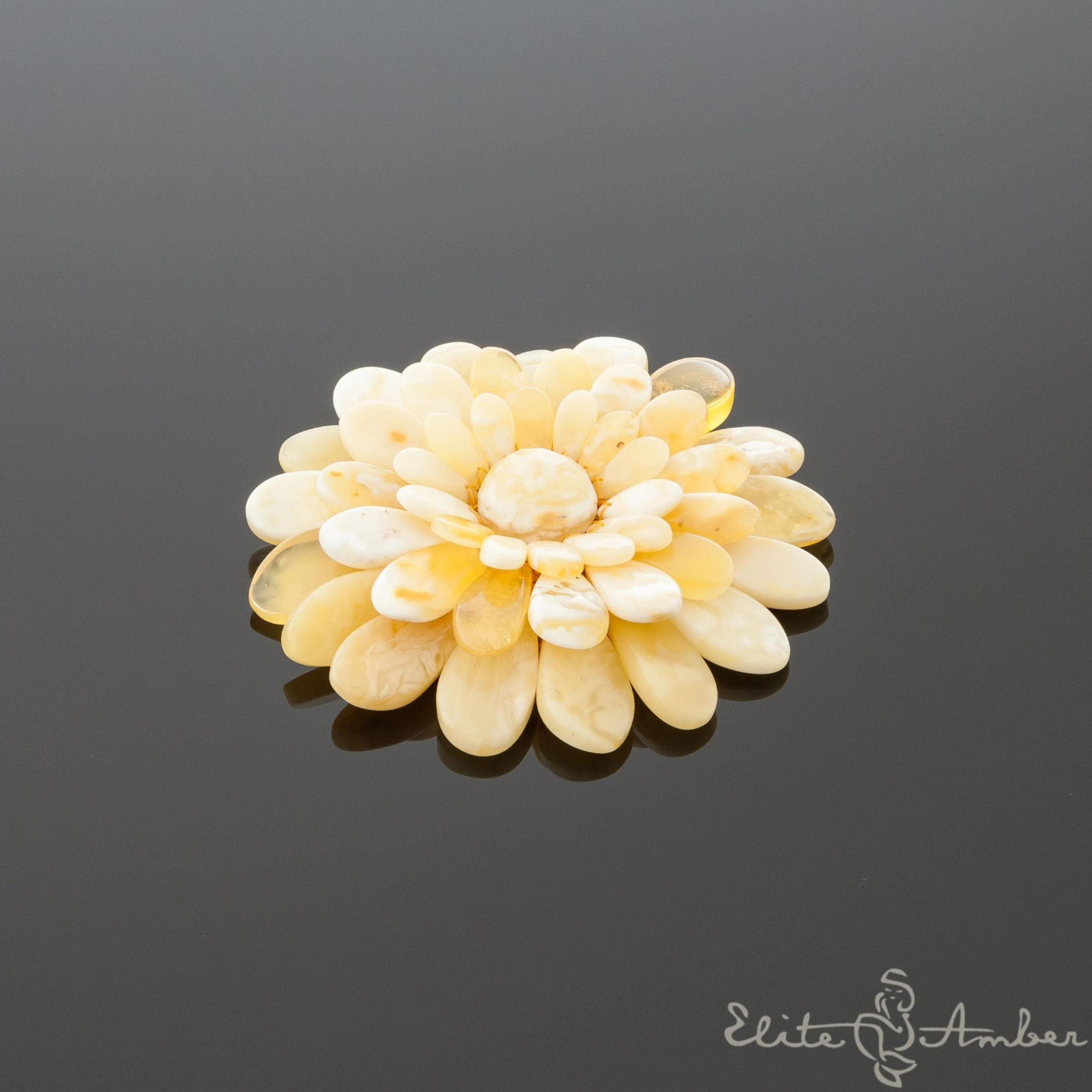 Amber brooch-pendant "Chamomile"